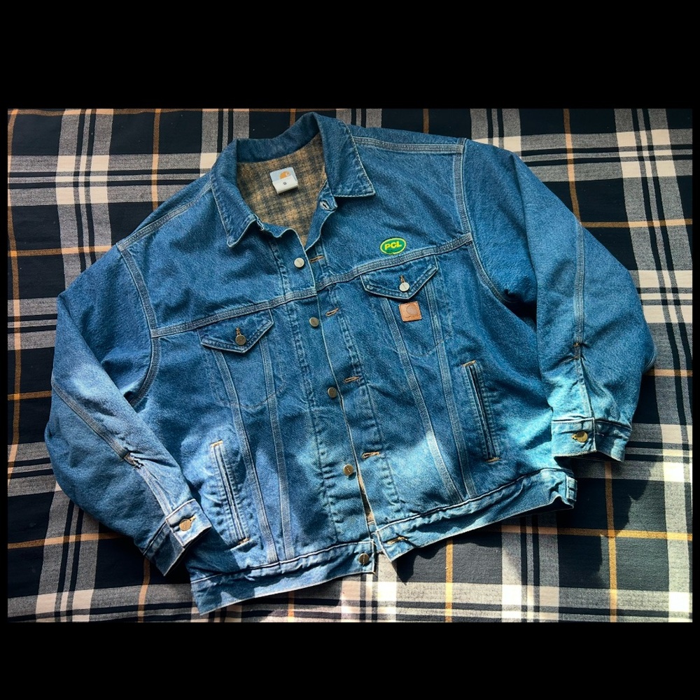 vintage Carhartt denim jacket that has really warm black and yellow plaid liner